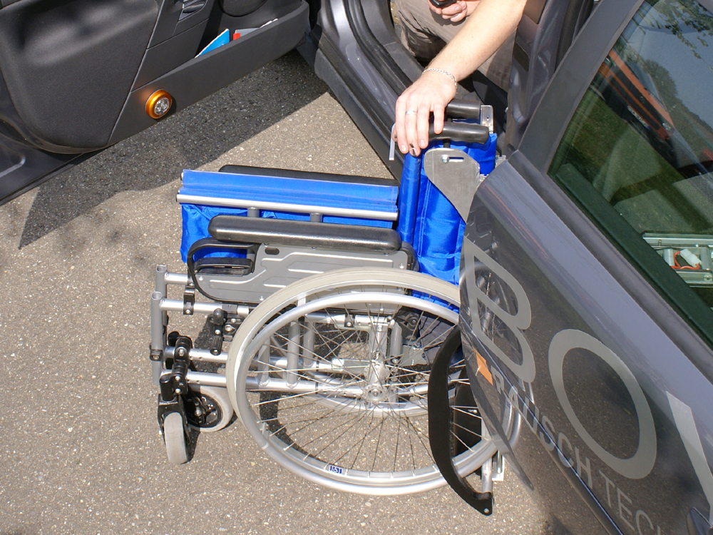 PORTE & ROBOT CHARGEUR - Chargement du fauteuil • Adapt' Services